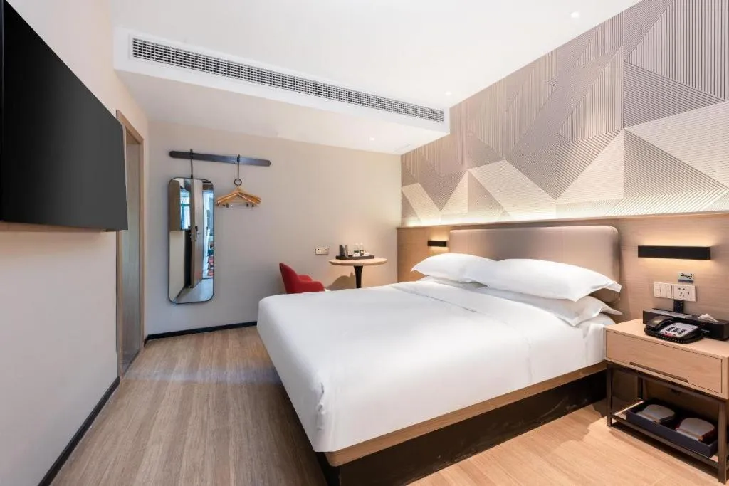 Bed in Borrman Hotel Wuhan First Hospital Hanzheng Street Metro Station