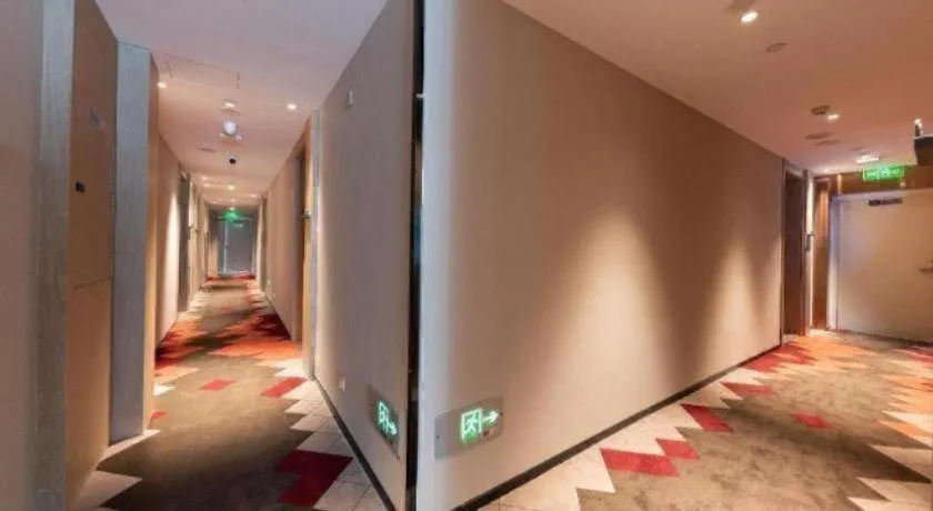 Bed in Borrman Hotel Wuhan First Hospital Hanzheng Street Metro Station