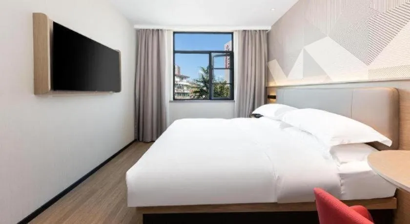 Bed in Borrman Hotel Wuhan First Hospital Hanzheng Street Metro Station