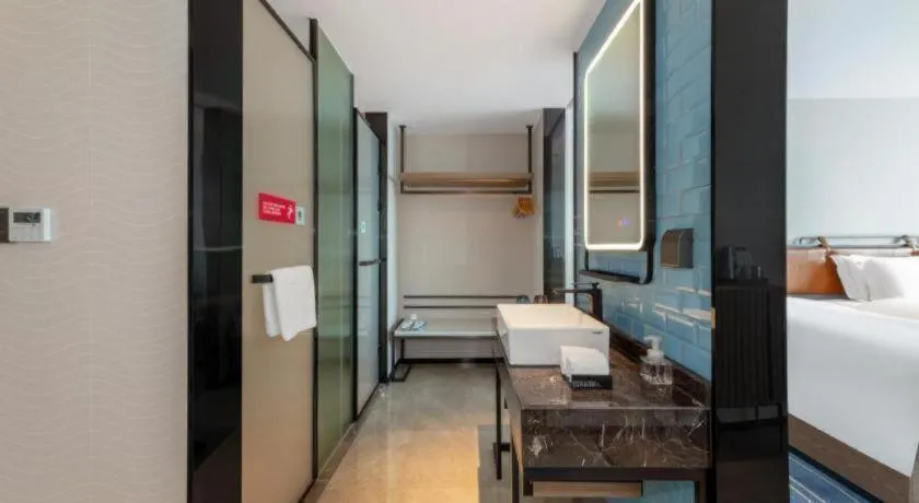 Bed in Echarm Hotel Zigong Machishui Wanda Plaza