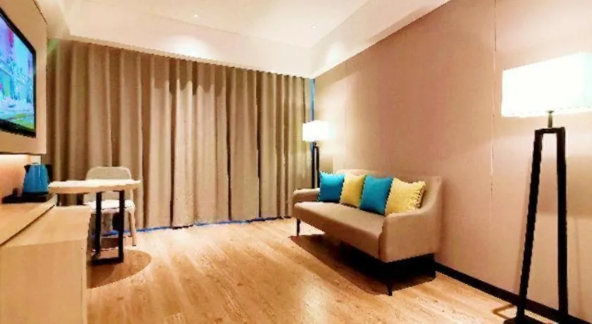 Bed in Echarm Hotel Wuhan Gaotie Jianshe 2nd Road Metro Exit