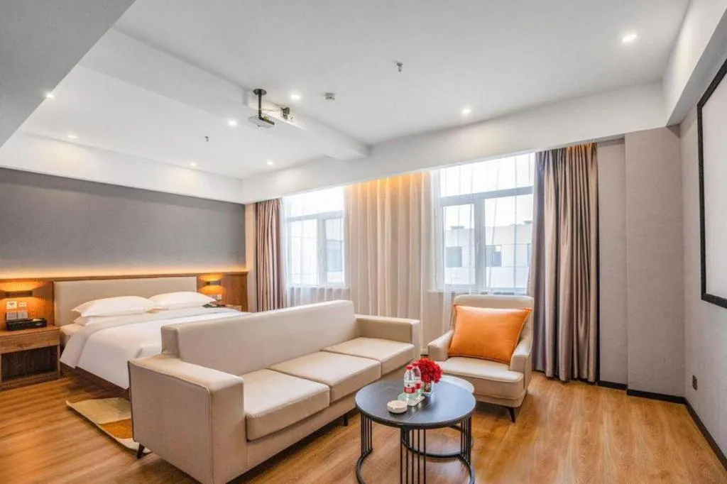 Bed in Borrman Hotel Zoucheng Huamaowan Mall