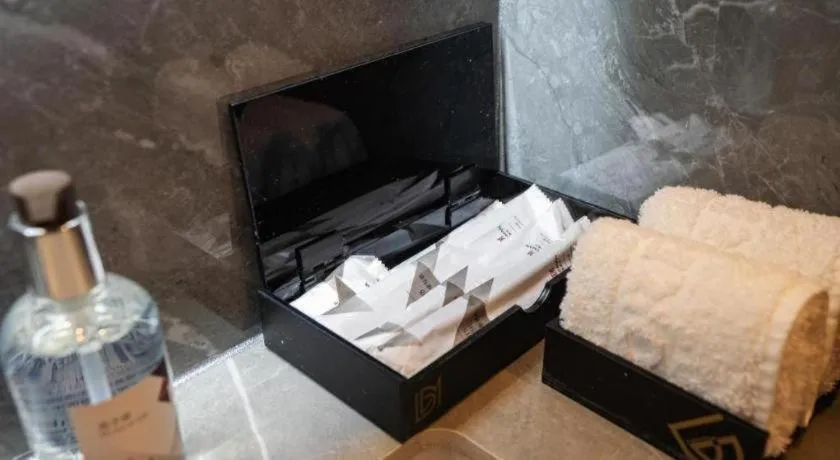 Bed in Borrman Hotel Zoucheng Huamaowan Mall