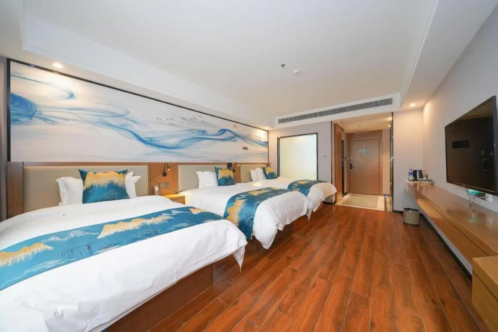 Bed in Borrman Hotel Nanning Anji Passenger Station Xijin Metro Station