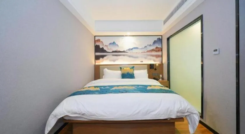 Bed in Borrman Hotel Nanning Anji Passenger Station Xijin Metro Station