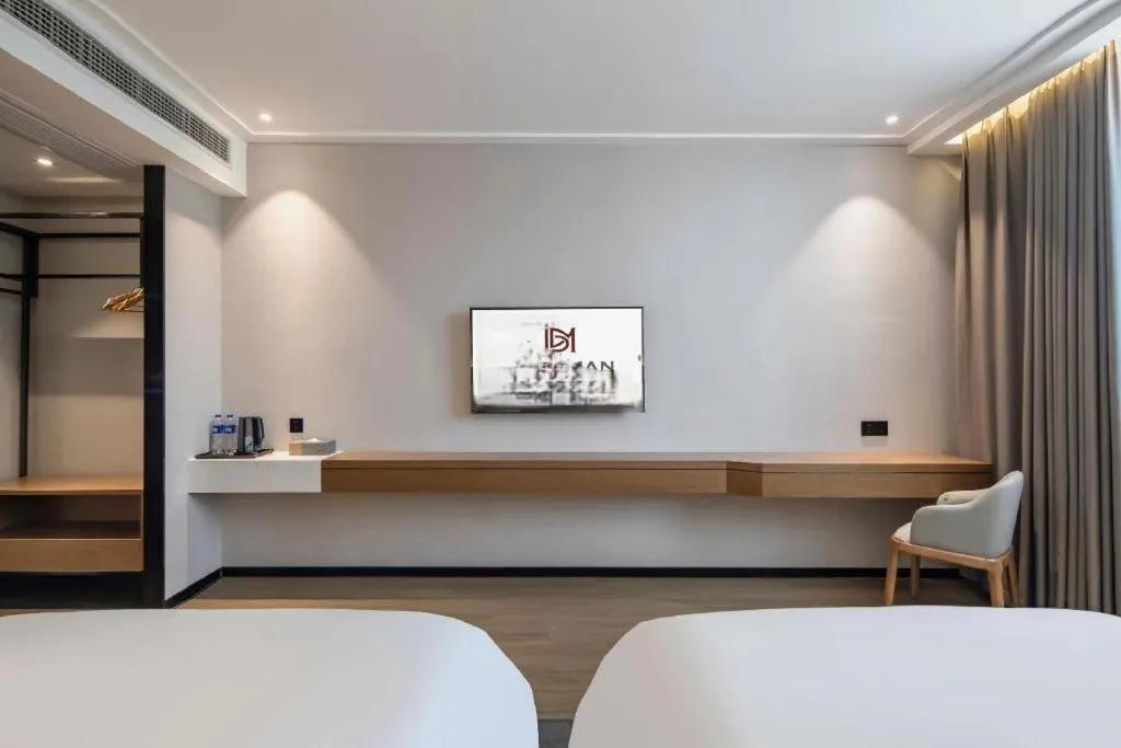 Bed in Borrman Hotel Nanning Anji Passenger Station Xijin Metro Station