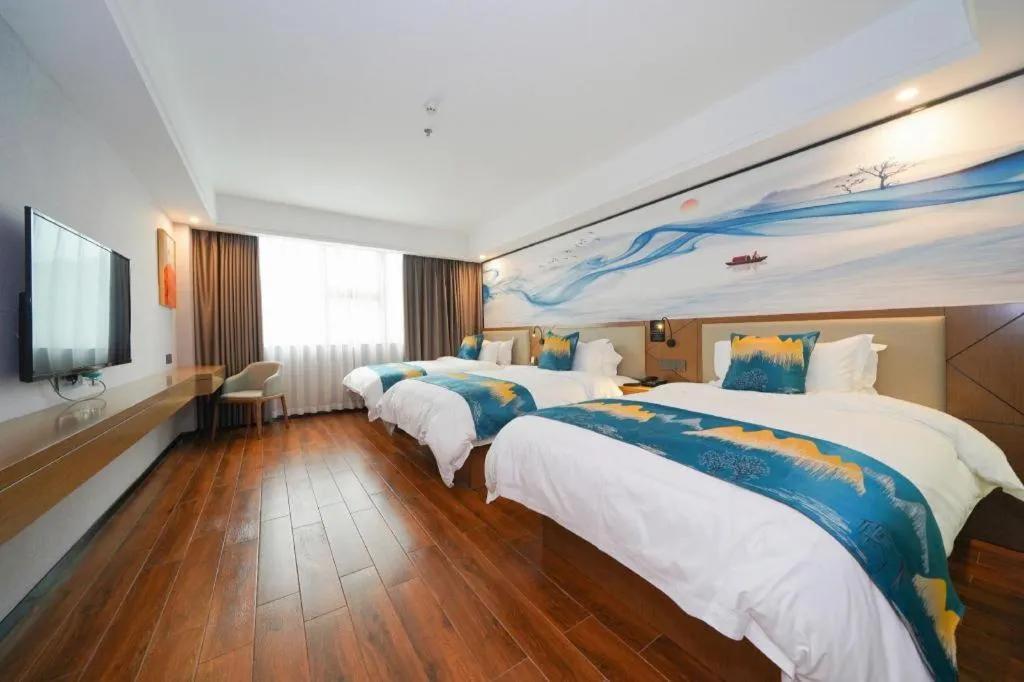 Bed in Borrman Hotel Nanning Anji Passenger Station Xijin Metro Station