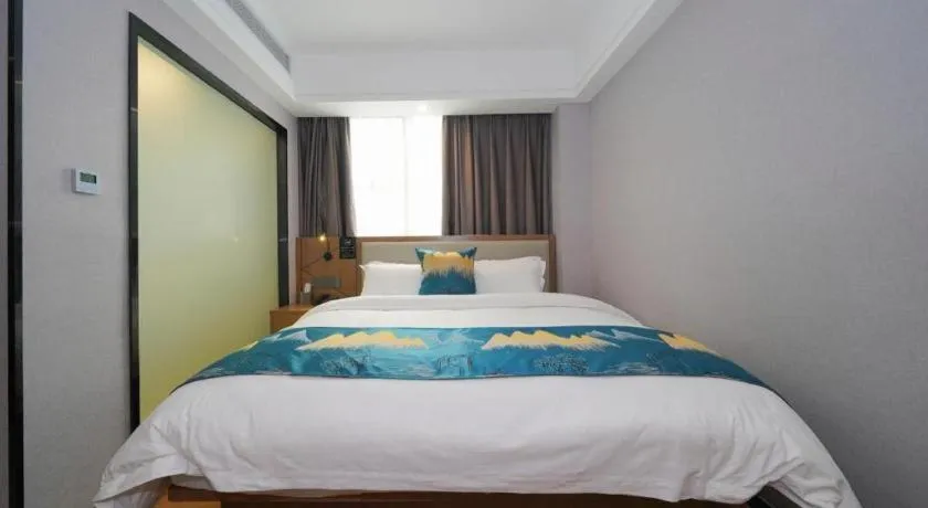 Bed in Borrman Hotel Nanning Anji Passenger Station Xijin Metro Station