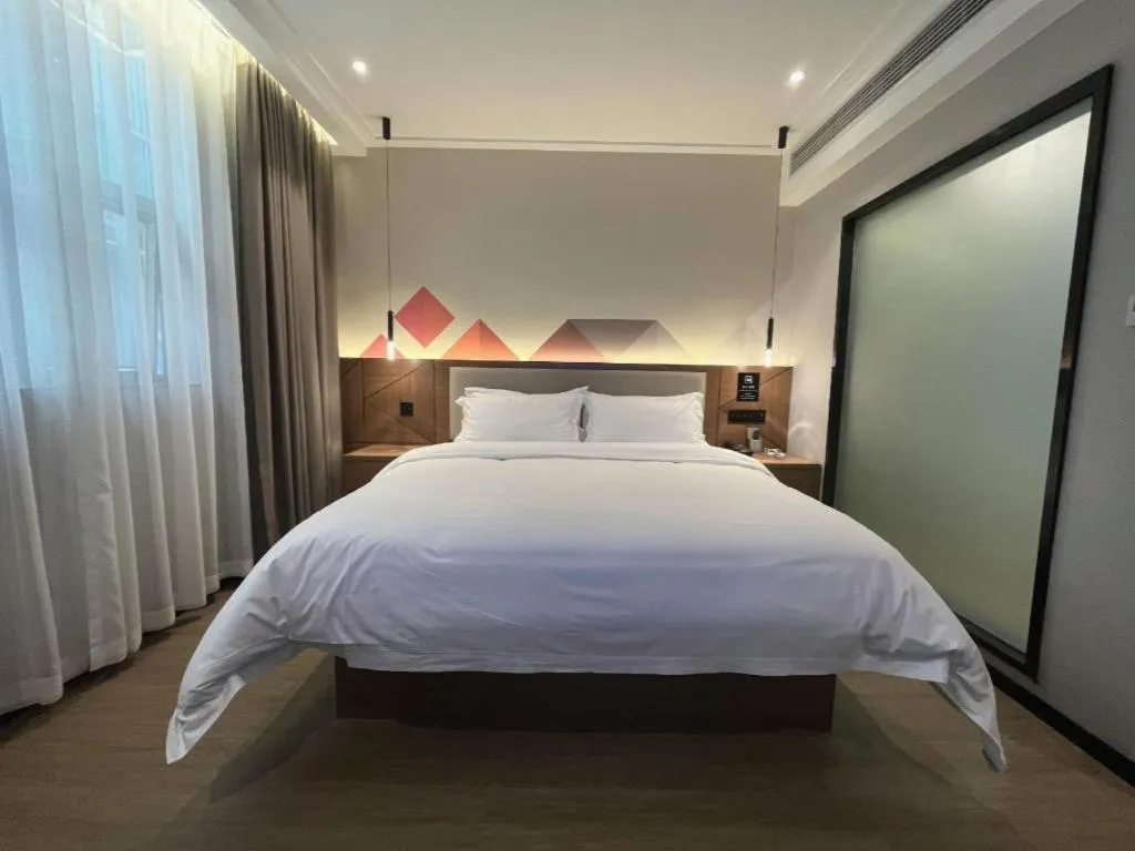 Bed in Borrman Hotel Nanning Anji Passenger Station Xijin Metro Station