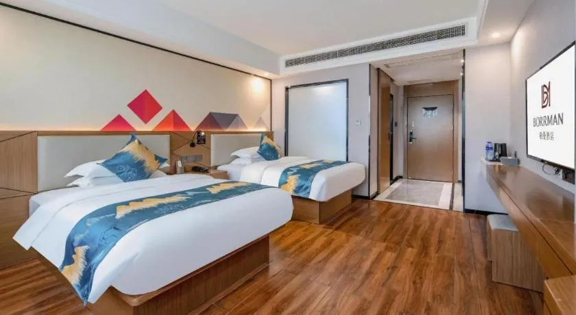 Bed in Borrman Hotel Nanning Anji Passenger Station Xijin Metro Station