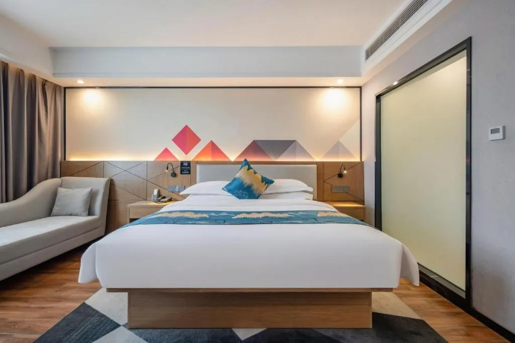 Bed in Borrman Hotel Nanning Anji Passenger Station Xijin Metro Station