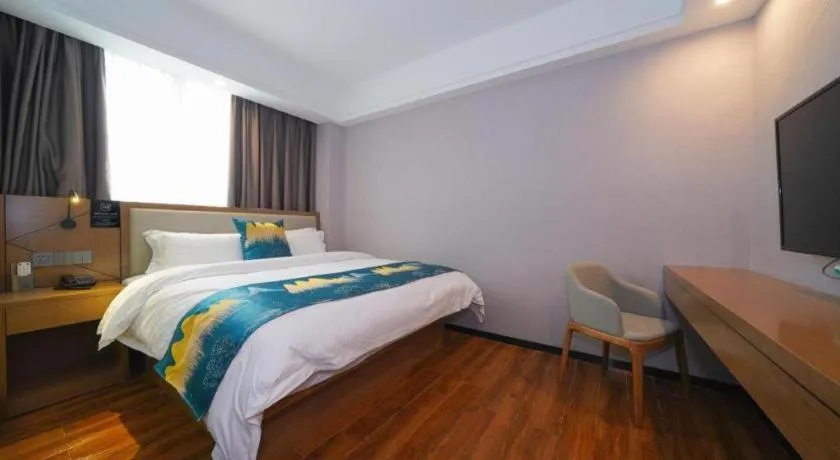 Bed in Borrman Hotel Nanning Anji Passenger Station Xijin Metro Station