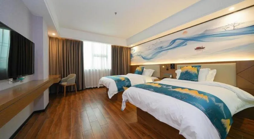 Bed in Borrman Hotel Nanning Anji Passenger Station Xijin Metro Station