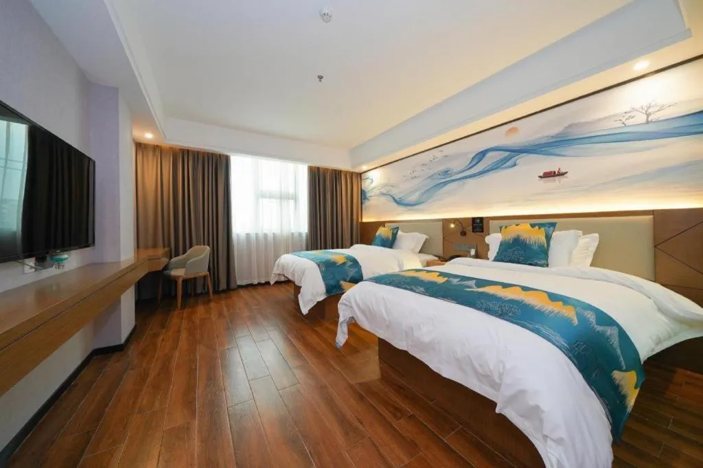 Bed in Borrman Hotel Nanning Anji Passenger Station Xijin Metro Station