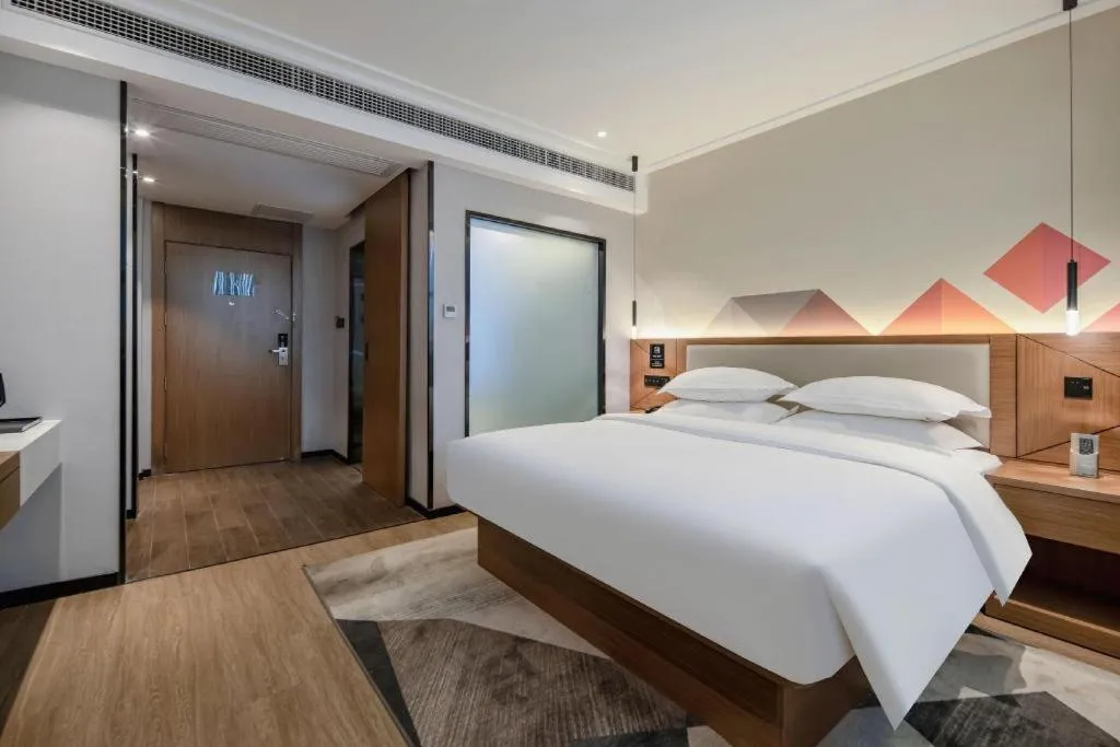 Bed in Borrman Hotel Nanning Anji Passenger Station Xijin Metro Station