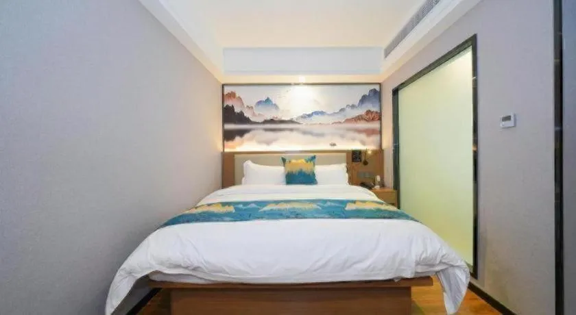 Bed in Borrman Hotel Nanning Anji Passenger Station Xijin Metro Station