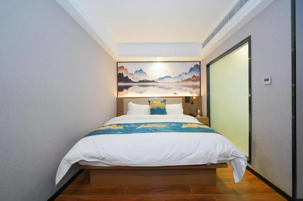 Bed in Borrman Hotel Nanning Anji Passenger Station Xijin Metro Station