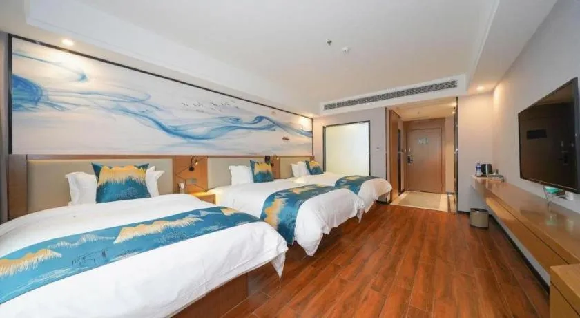 Bed in Borrman Hotel Nanning Anji Passenger Station Xijin Metro Station