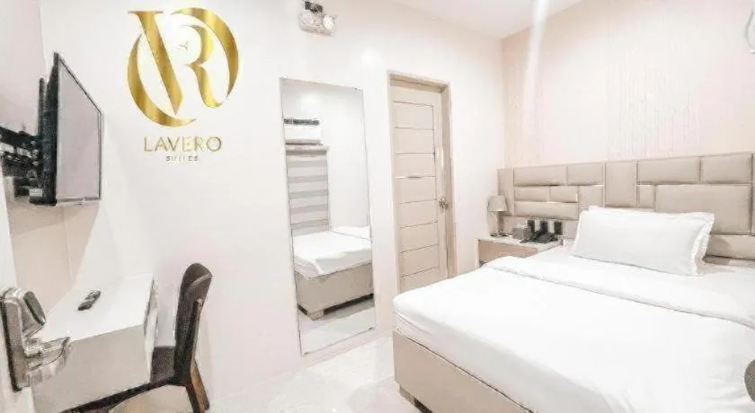 Bed in LAVERO SUITES