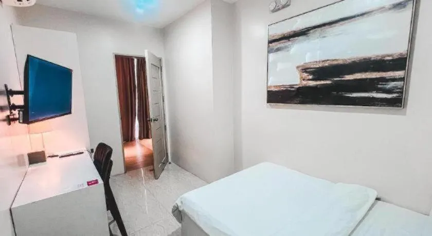 Bed in LAVERO SUITES