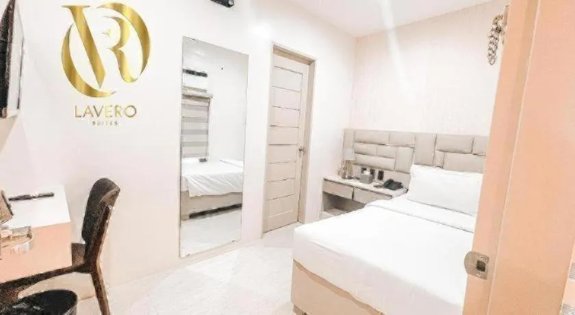 Bed in LAVERO SUITES