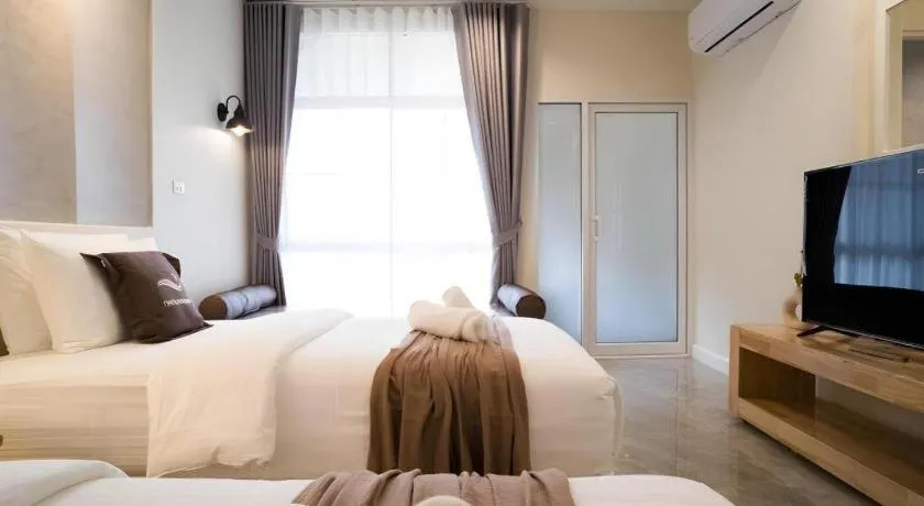 Bed in Nanlamoon Hotel