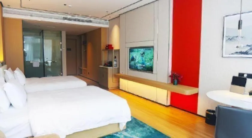 Bed in Ramada Encore by Wyndham Jinan Shanghe