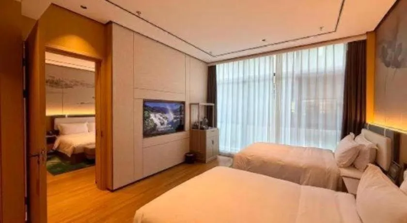 Bed in Ramada Encore by Wyndham Jinan Shanghe