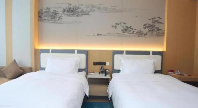 Bed in Ramada Encore by Wyndham Jinan Shanghe