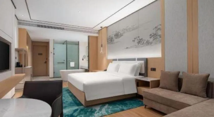 Bed in Ramada Encore by Wyndham Jinan Shanghe