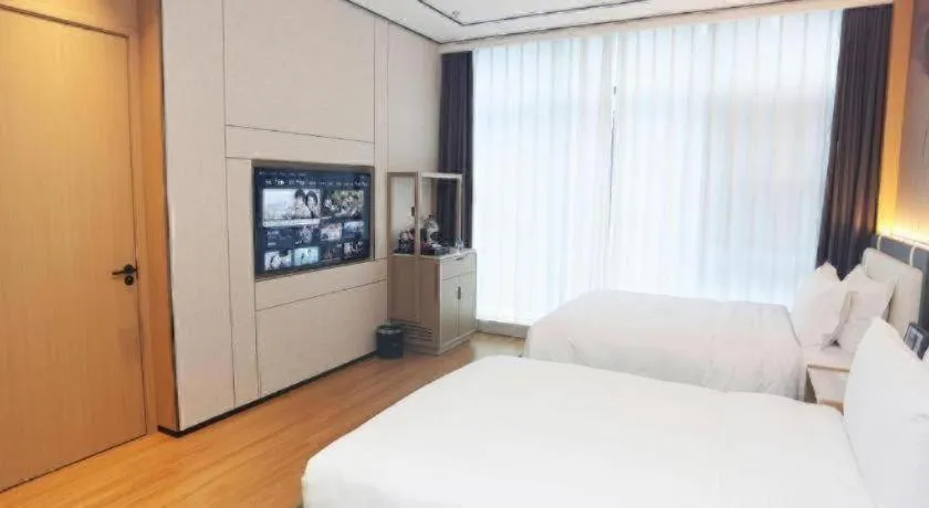 Bed in Ramada Encore by Wyndham Jinan Shanghe