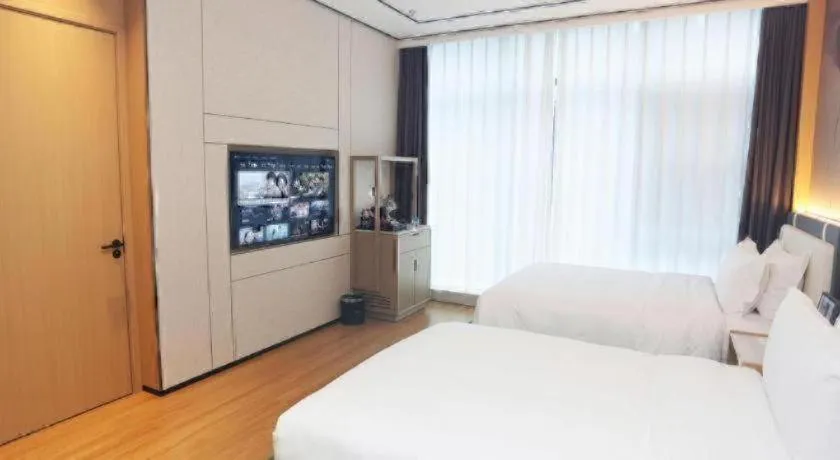 Bed in Ramada Encore by Wyndham Jinan Shanghe