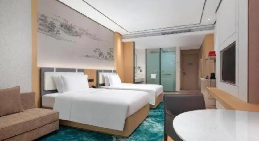 Bed in Ramada Encore by Wyndham Jinan Shanghe