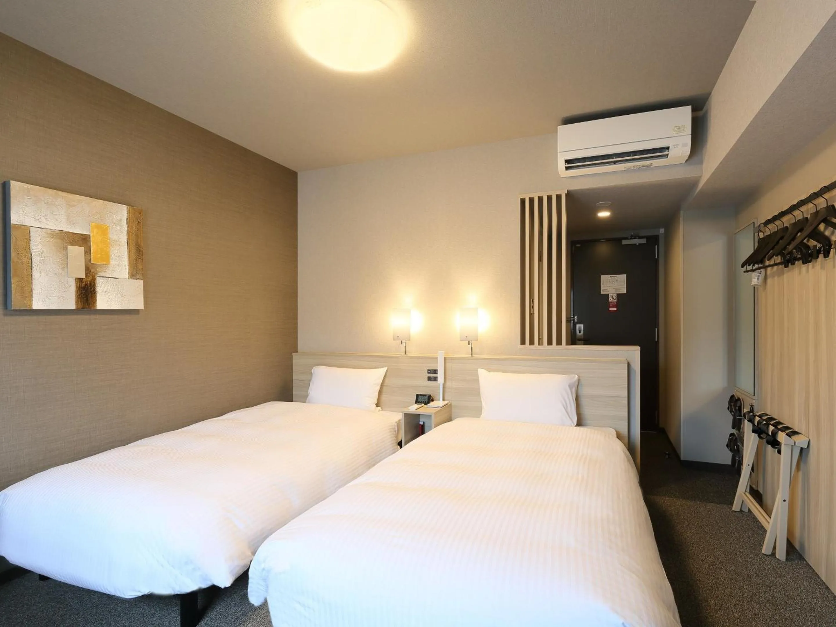 Photo of the whole room, Bed in Hotel Route Inn Grand Kainan Ekimae