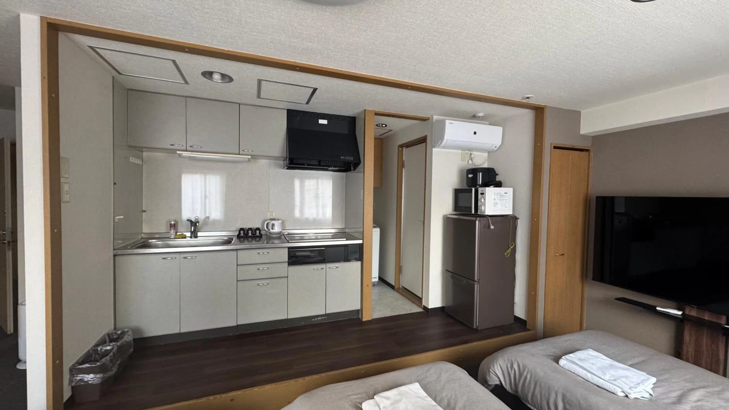 Kitchen or kitchenette, Bed in Sapporo Oriental Hotel