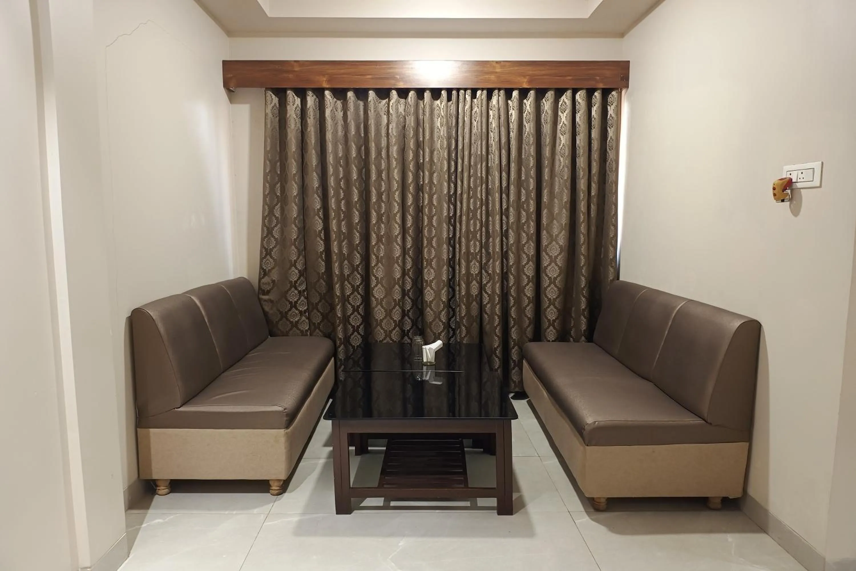 Seating area in Hotel Apratim Lodging & Boarding