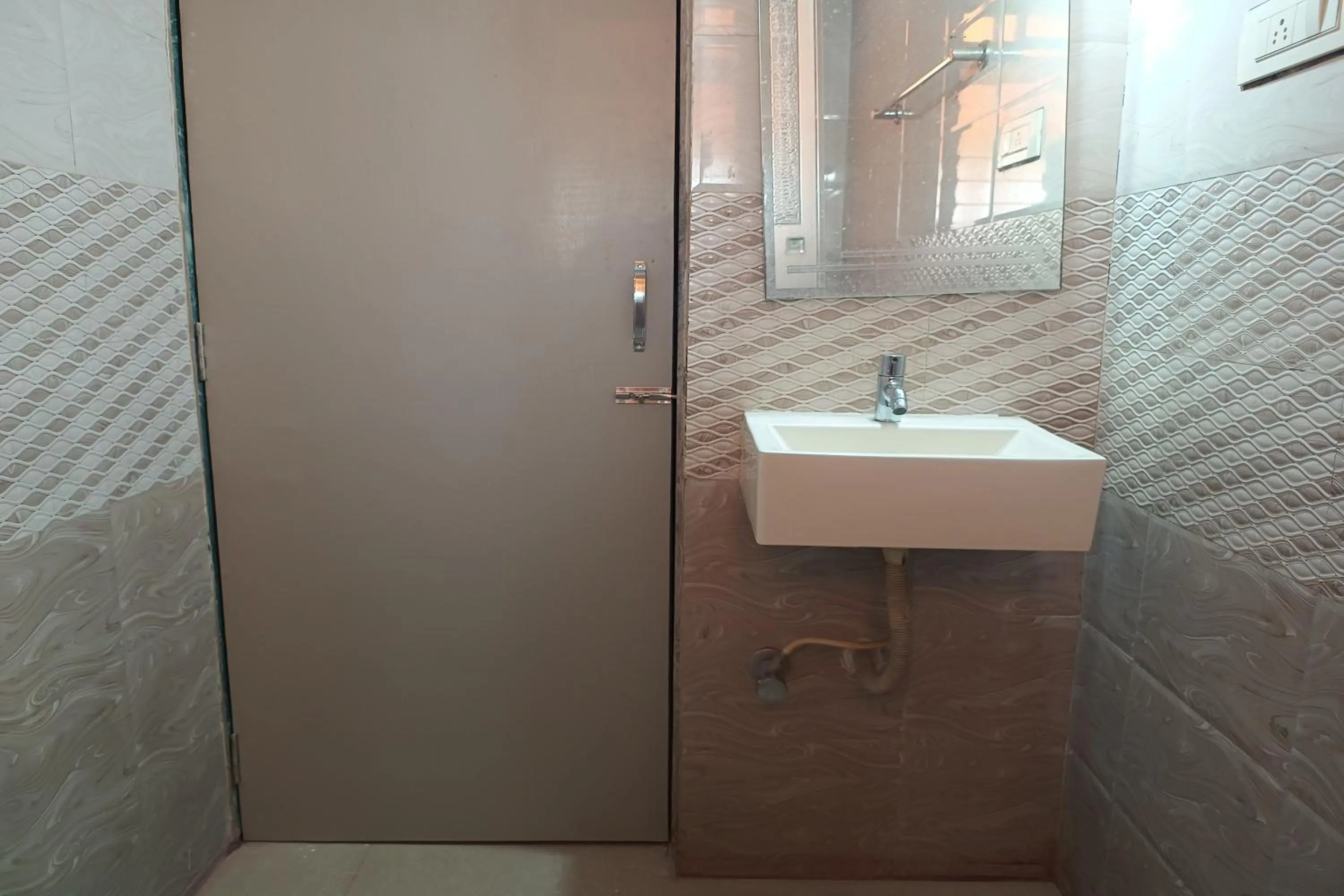 Bathroom in Hotel Apratim Lodging & Boarding