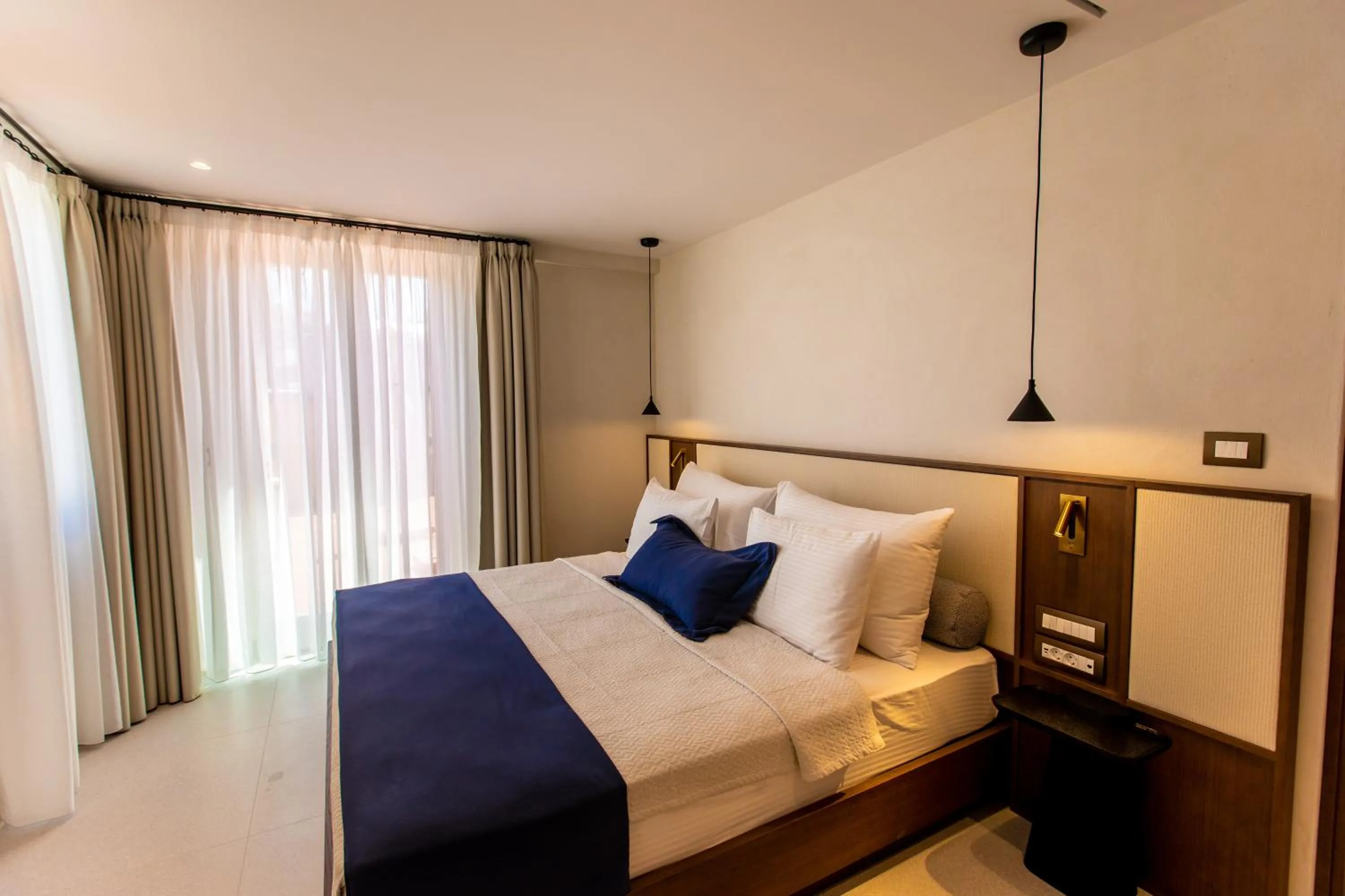 Bed in Islet Santorini Infinity Caldera Villa
