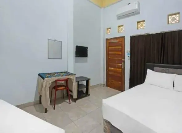 Double or Twin Room in Wisma Dhana Syariah Double or Twin Room in Wisma Dhana Syariah