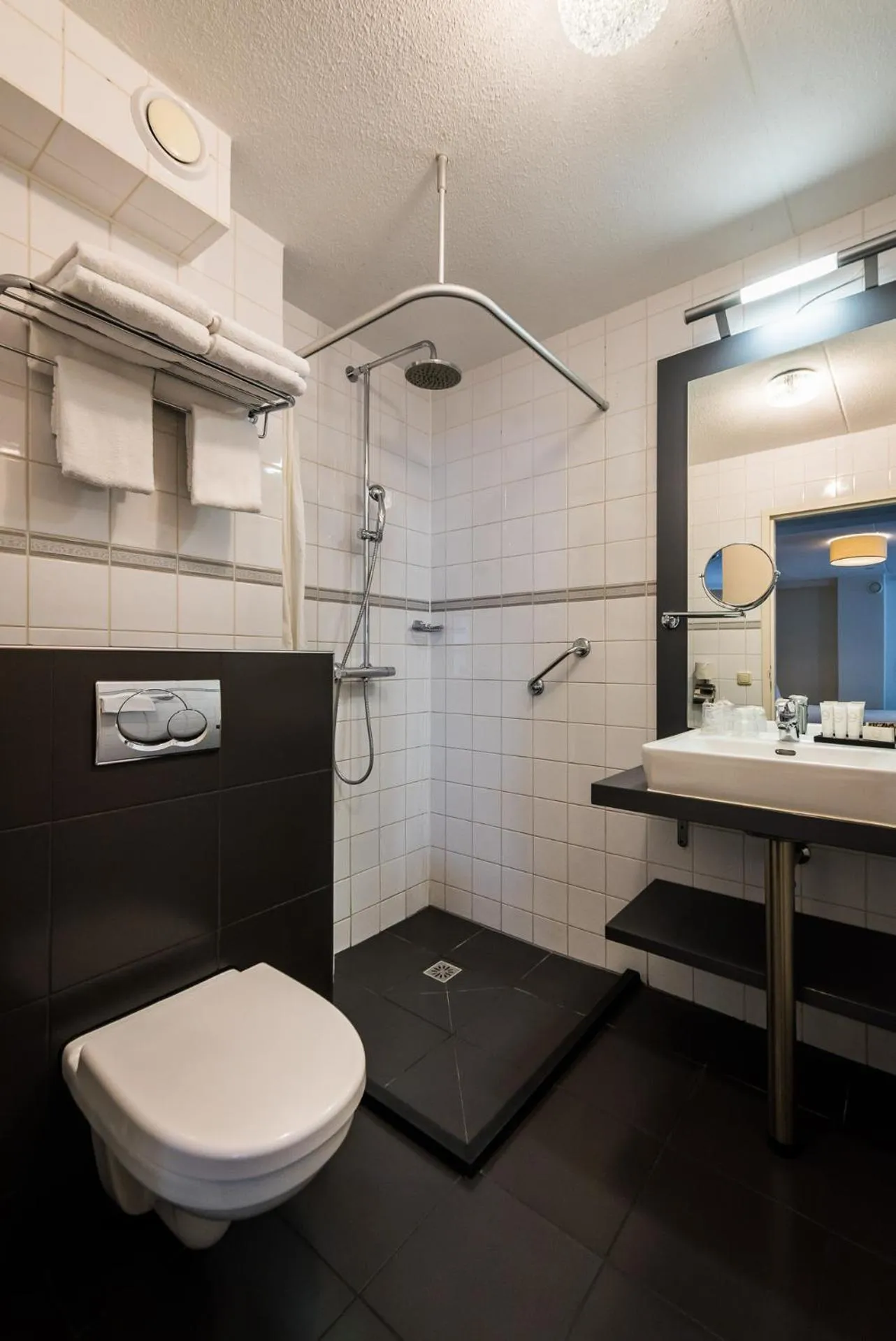 Bathroom in Prominent Inn Hotel