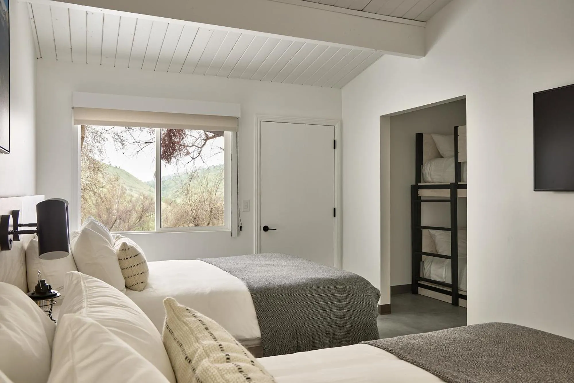 Bed in AutoCamp Sequoia