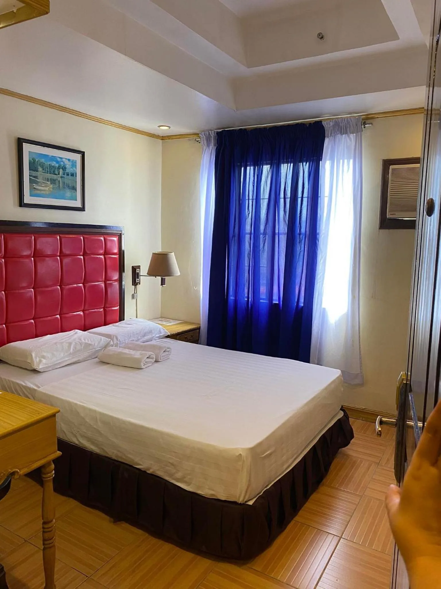 Bed in Sugarland Suites