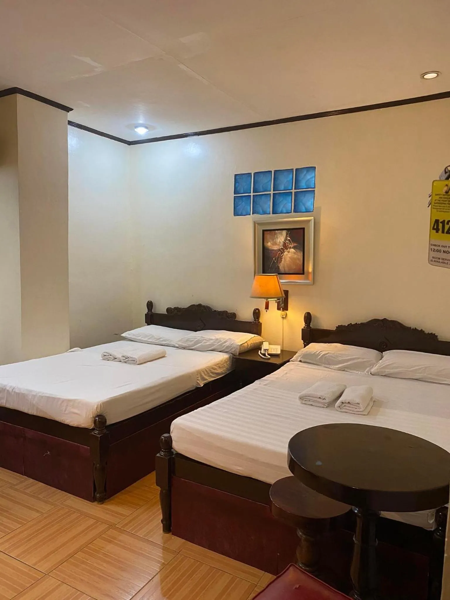 Bed in Sugarland Suites