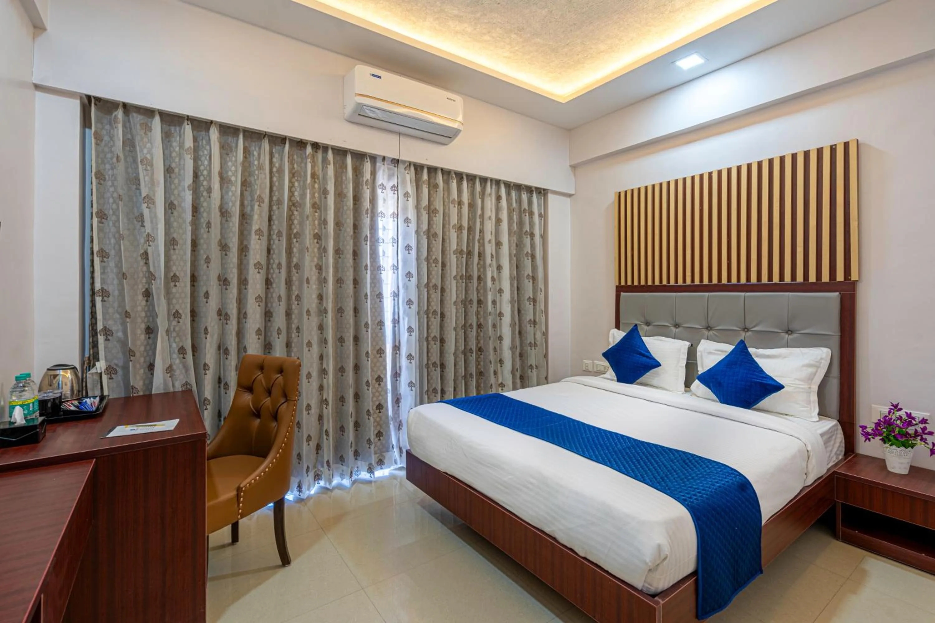 Bed in StayBird - Divine Suites, Business Hotel, Kharadi