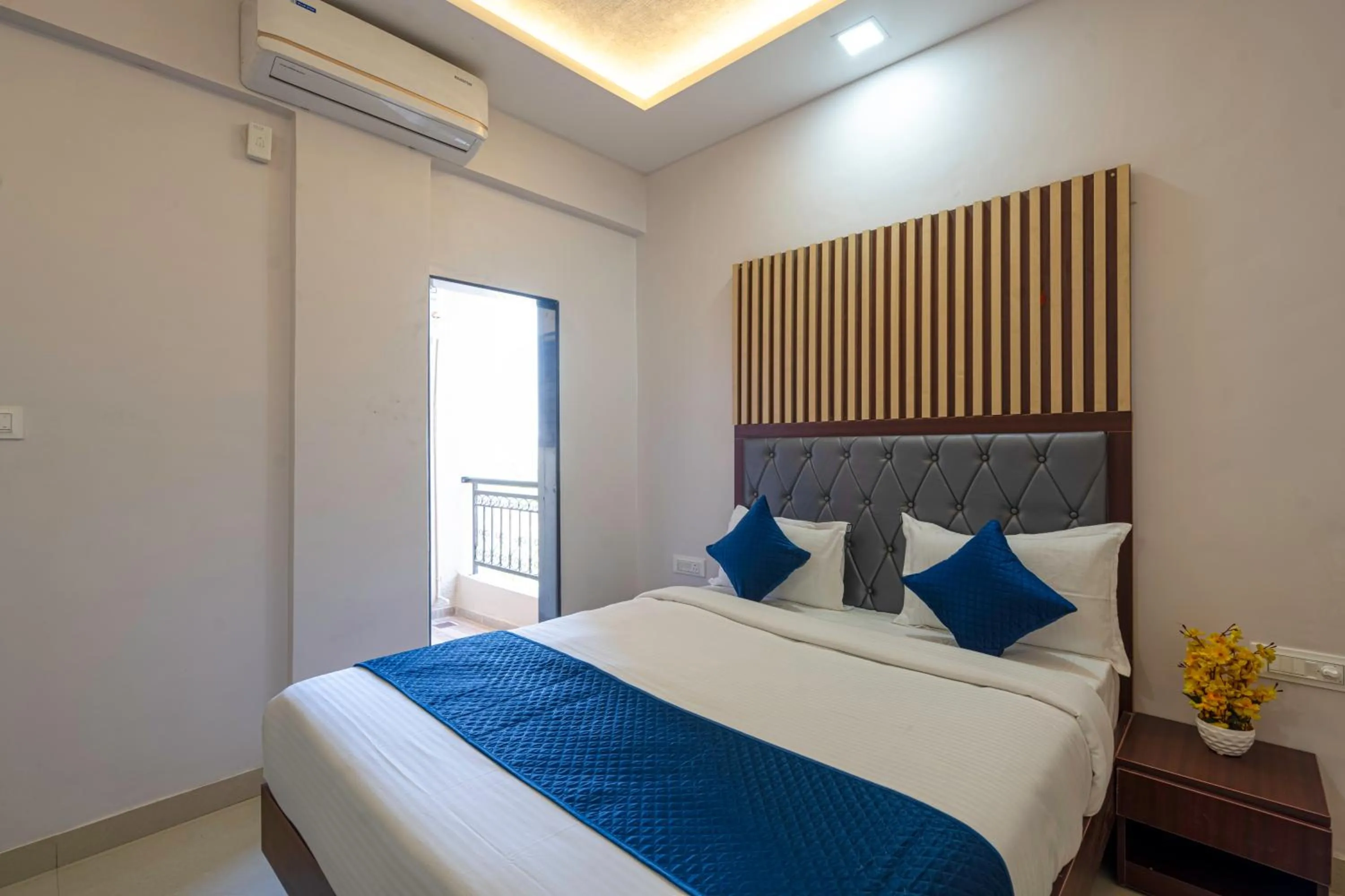 Bed in StayBird - Divine Suites, Business Hotel, Kharadi