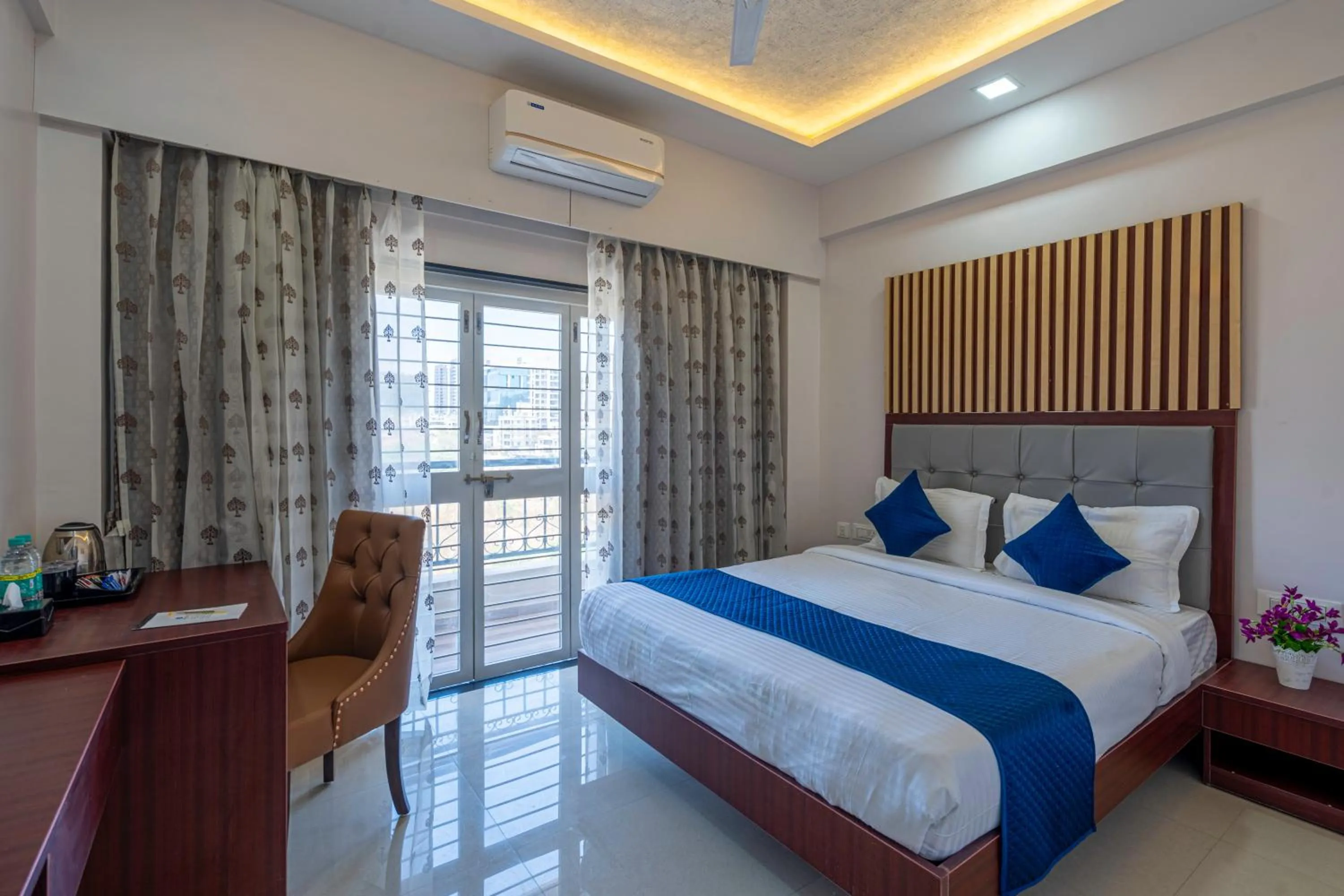 Bed in StayBird - Divine Suites, Business Hotel, Kharadi