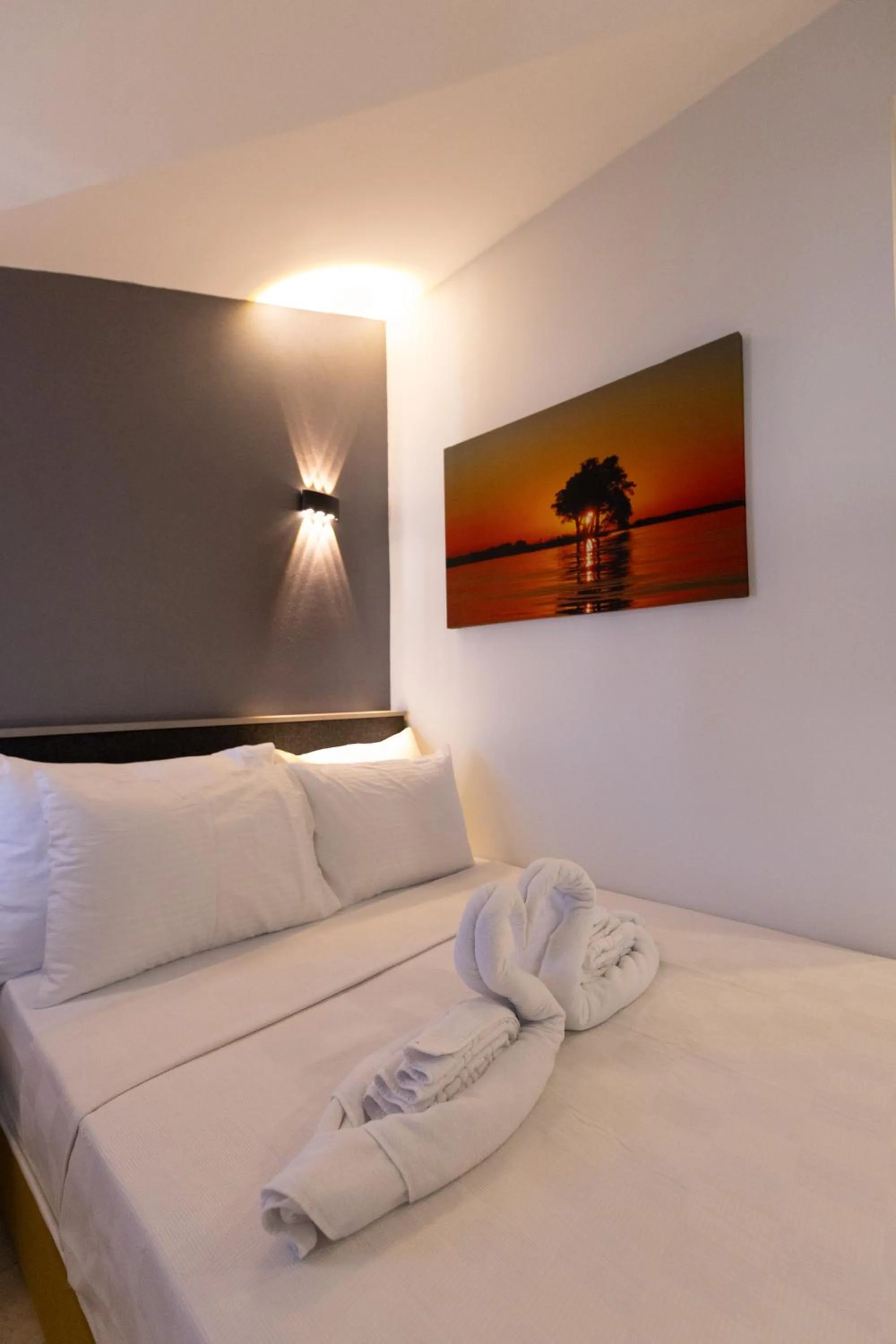 Bed in Three Points Hotel