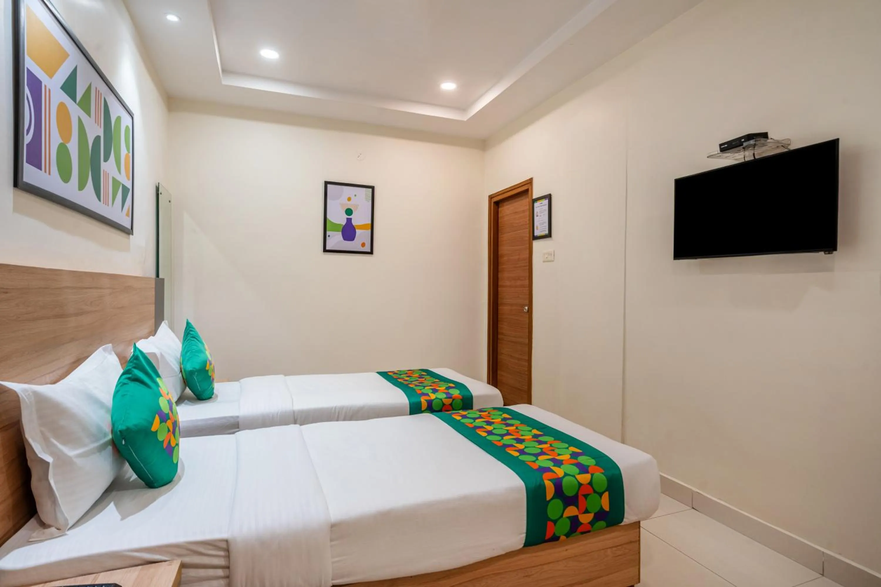 Bedroom, Bed in Treebo Sapphire Bliss