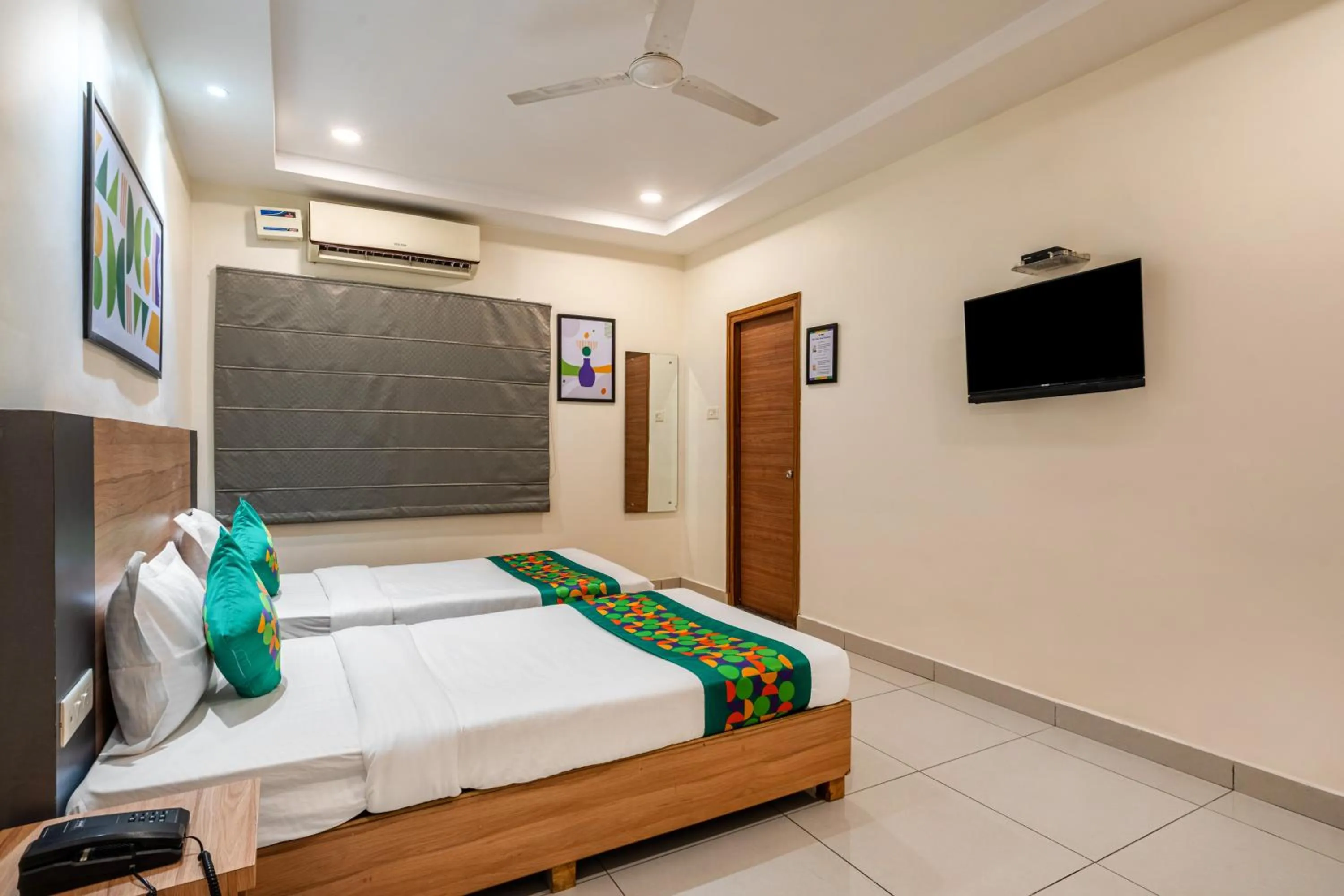 Bedroom, Bed in Treebo Sapphire Bliss