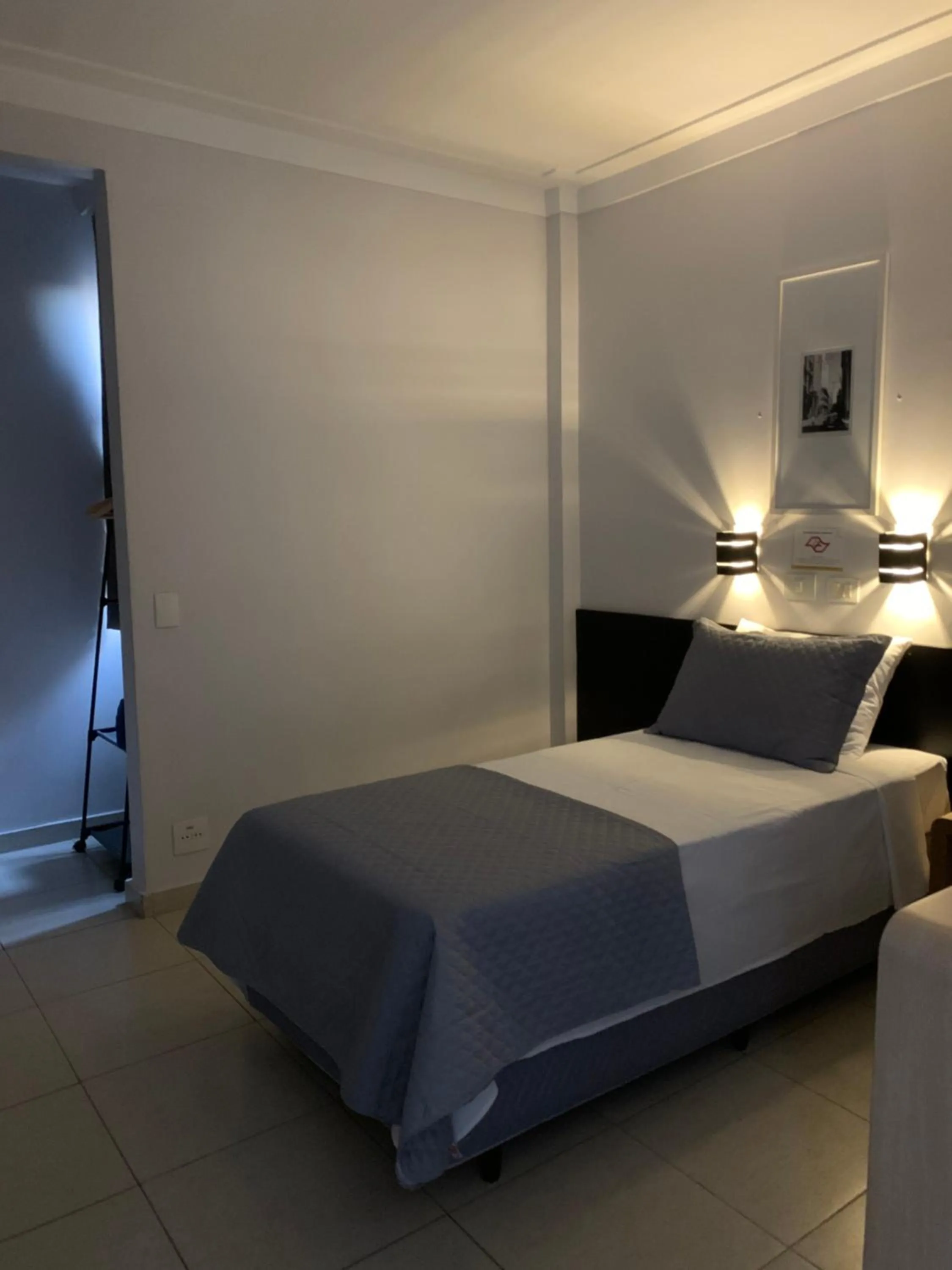 Bed in Lory Studio Hotel